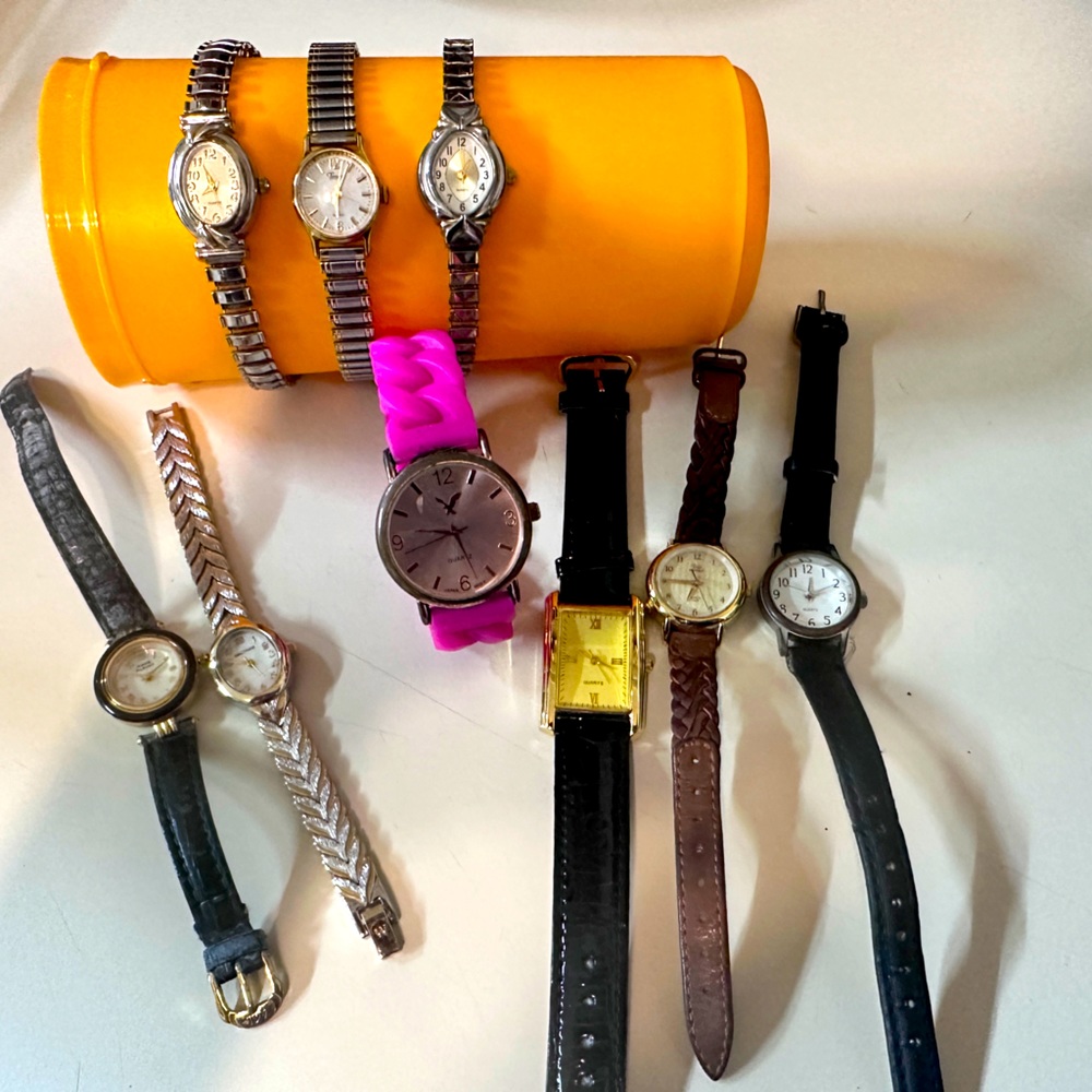 Bundle of nine watches.